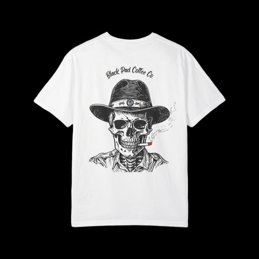 White t-shirt with a black and white graphic of a skeleton wearing a hat and smoking a cigarette, with 'Black Pad Coffee Co' text on the back.